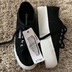 Black brand new Supergas sneakers